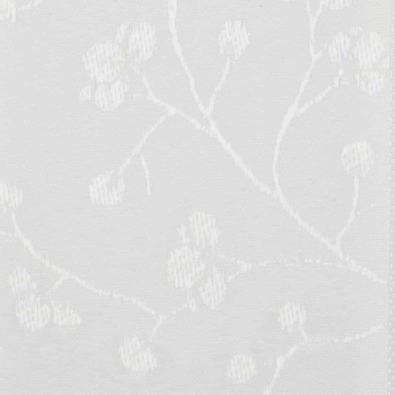 White jacquard curtain fabric with subtle raised vine-and-berry motif, hanging flat and filtering light; close-up shows woven texture and delicate embroidered appearance in a neutral, softly lit interior.