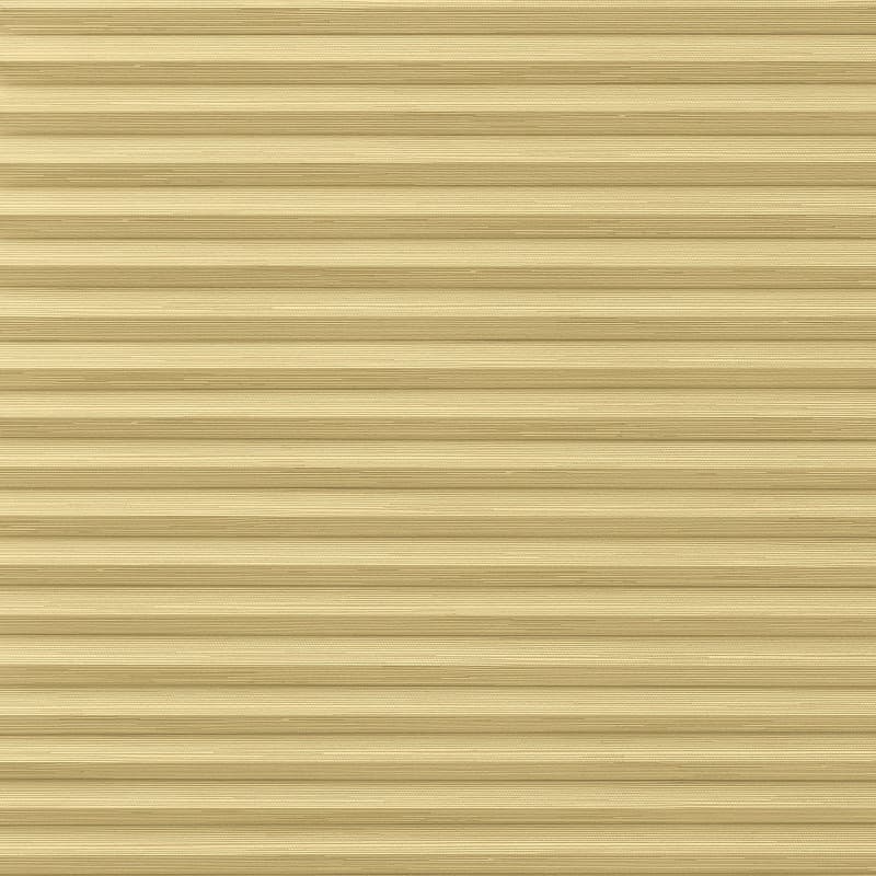 Beige horizontal pleated fabric blinds with narrow slats and woven texture; fully closed, softly filtering light; occupies an interior window frame, creating a warm, neutral ambient glow.