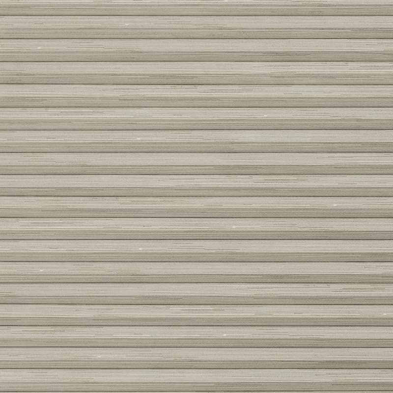 Beige horizontal slatted roller blind, fully lowered with wood-grain texture and narrow ridged slats; closed and blocking light, filling the frame against neutral indoor lighting.