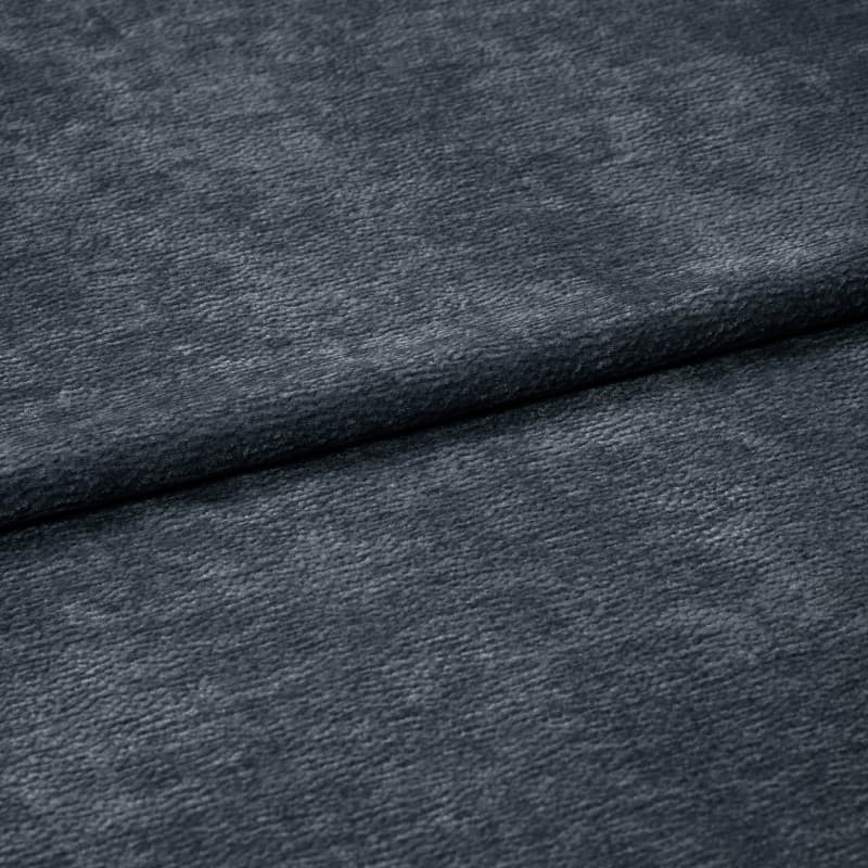 Dark gray textured fabric, folded horizontally with a visible soft nap; draped flat across a surface in a close-up, evenly lit composition with no surrounding context.