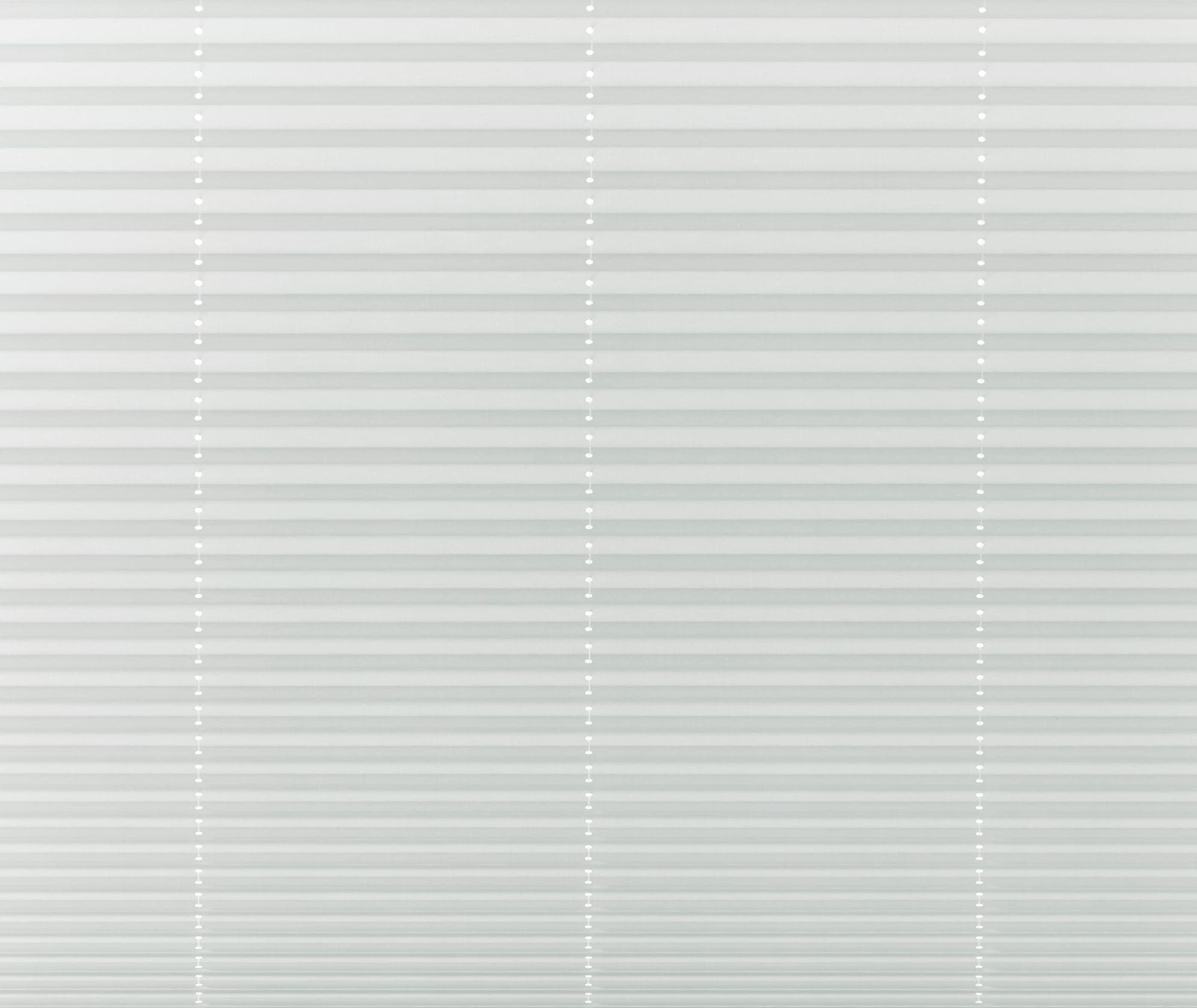 White horizontal pleated blinds with evenly spaced vertical bead cords, fully closed and diffusing soft daylight; minimal interior setting, neutral lighting, no outside view visible.