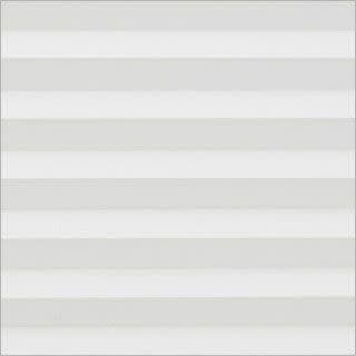 White horizontal blinds, evenly spaced slats covering a window; closed, softly diffusing daylight into a bright, neutral interior with no visible view.