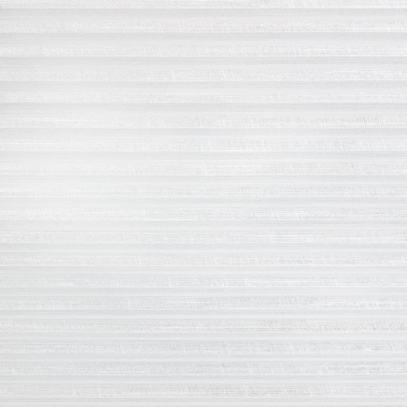 White pleated cellular blind covering entire window, fully closed and filtering soft daylight; subtle horizontal fabric texture in a bright, minimally furnished interior.