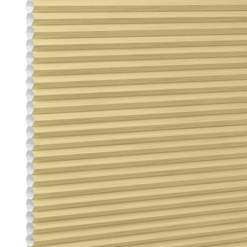Honeycomb cellular blind, beige with visible hexagonal cells at left edge and narrow horizontal pleats â€” fully lowered and closed, filtering soft light in a close-up, neutral setting.