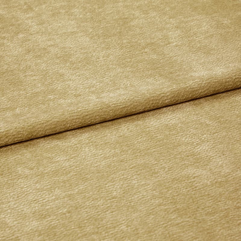 Beige plush, short-pile fabric folded across the frame, showing a neat horizontal fold; close-up view with soft, even lighting on a neutral background.