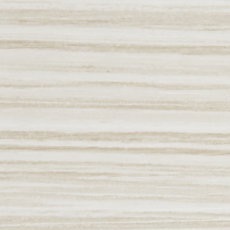 Beige horizontal wood-grain paneling, with subtle pale stripes running across the surface, covering the entire frame and suggesting a light, neutral wall or tabletop under soft, diffuse lighting.