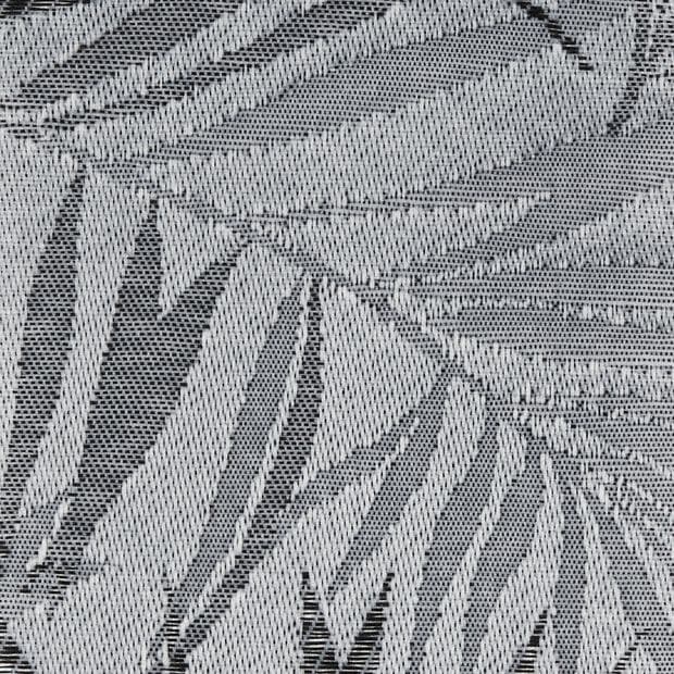 Sheer woven curtain panel hung over a window, showing stylized palm-leaf jacquard in light and dark threads; backlit close-up revealing textured, neutral-toned fabric.