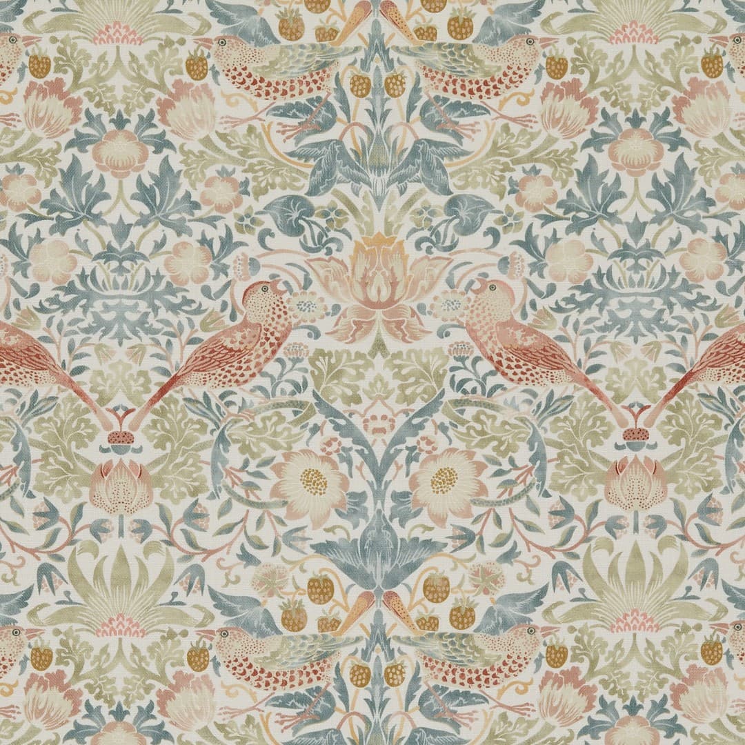 Wallpaper fabric patterned with stylized birds, tulips, and foliage repeats symmetrically across the surface in soft pastel greens, blues, and peaches, evoking a vintage Arts-and-Crafts floral motif.
