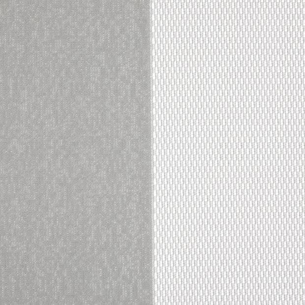 Two curtain panels—left opaque gray, right white sheer with small rectangular mesh—hang side-by-side, the sheer diffusing light while the opaque blocks it; close-up interior view.