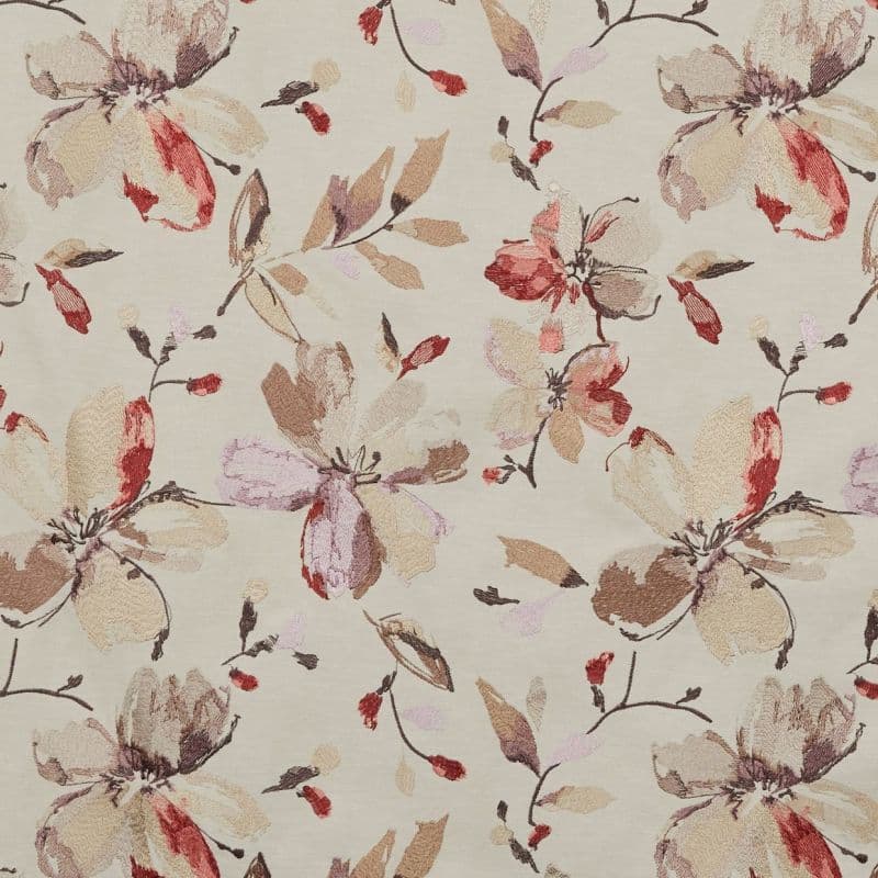 Beige embroidered-style fabric with large floral motifs (object); repeats across the surface in a scattered pattern (action); neutral, textured textile sample with muted pink, red, and brown tones (context).