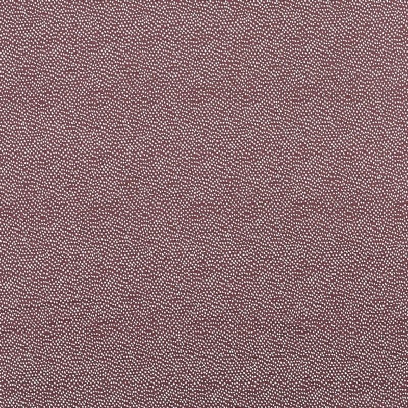 Burgundy wallpaper with densely scattered small irregular white dots, repeating across the surface, shown in a close-up, evenly lit, flat field with no other visible features.