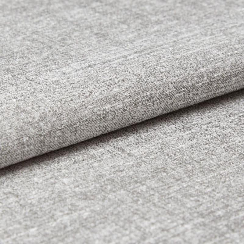 Gray woven upholstery fabric folded in a neat horizontal overlap, revealing a textured weave and soft pile; close-up studio view with even, diffuse lighting and a neutral background.