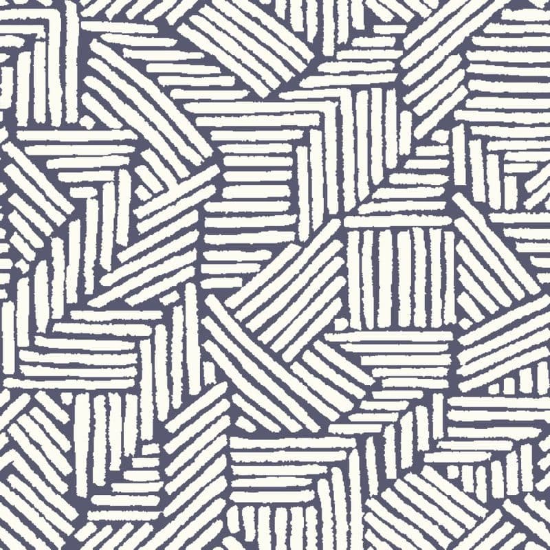 Navy-and-cream geometric wallpaper of short, hand-drawn parallel brushstrokes grouped into angled squares and rectangles, tessellating across the wall to create a repetitive, textured mosaic.