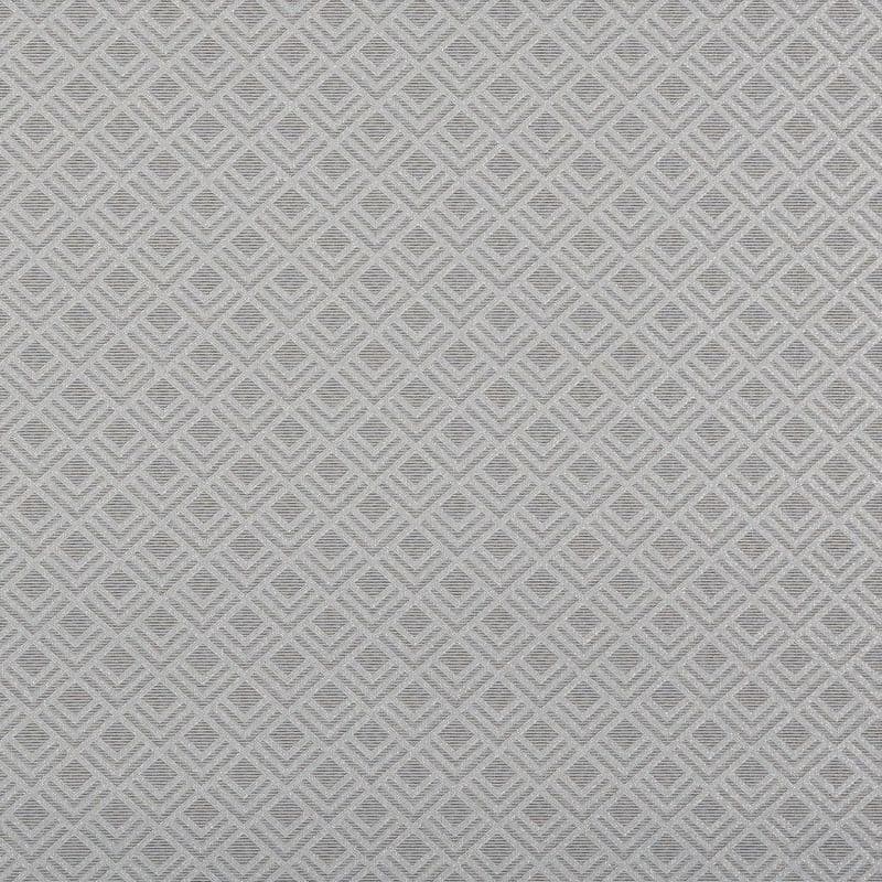 Grey woven textile with raised diamond lattice pattern, covering a flat surface and lying taut, shown in a close-up indoor view with subtle shadows and neutral, even lighting.