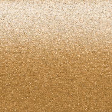 Gold metallic textured surface exhibiting a horizontal gradient—lighter at top, darker at bottom—shimmering with fine granular sparkle under even, diffuse lighting as a uniform background.