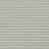 Light-gray pleated cellular shade, fully lowered with textured horizontal folds; closed, blocking view and softly diffusing daylight; fills a neutral, minimally lit interior wall with uniform, muted tone.