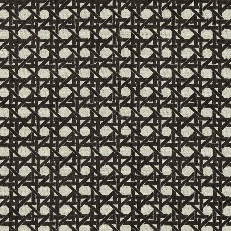 Black angular lattice-patterned fabric covering a surface, repeating tessellated triangles across a textured beige weave, shown as a close-up swatch with neutral lighting and no visible surroundings.