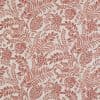 Patterned wallpaper (coral-red botanical prints of leaves, flowers and pomegranate-like fruit) — printed in repeating motifs — photographed flat as a close-up sample on a cream background, evenly lit.