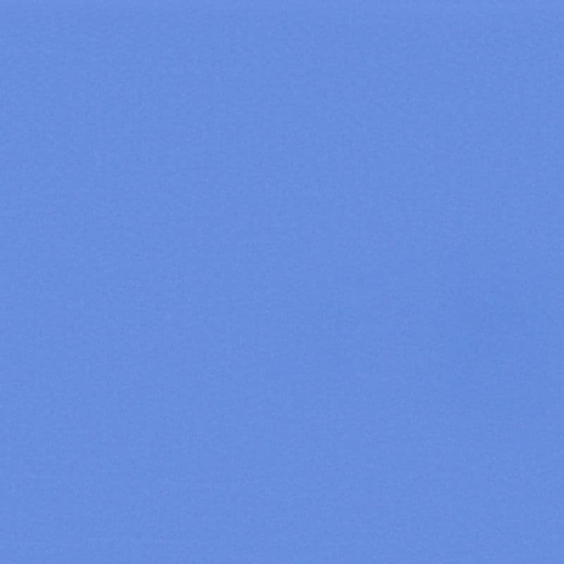 Uniform light-blue surface occupying the entire frame, appearing as a smooth, slightly textured expanse, evenly lit and featureless with soft, diffuse lighting.