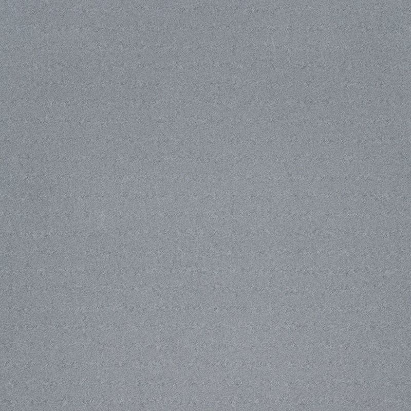 A coarse grey fabric surface (no curtains or blinds), filling the frame; texture appears densely stippled and static, lying flat under even, neutral indoor lighting with no visible context.