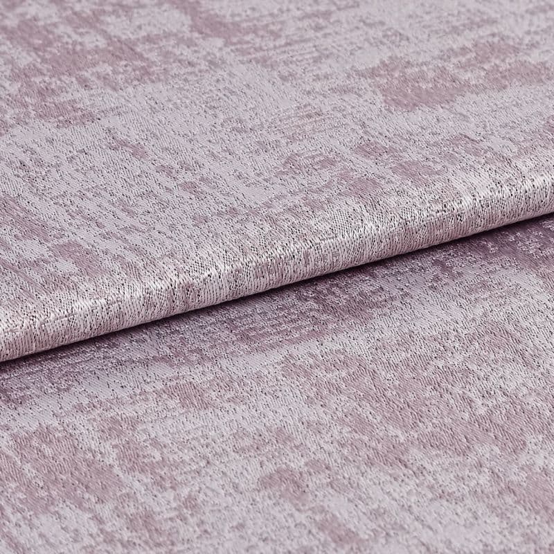 Plush mauve velvet fabric with crushed texture, folded; overlapping to show sheen and pile; close-up studio shot with soft, even lighting.
