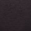 Dark charcoal wood-grain panel with fine horizontal striations and irregular darker patches, forming a uniform matte surface; close-up view in low ambient light with no visible surroundings.