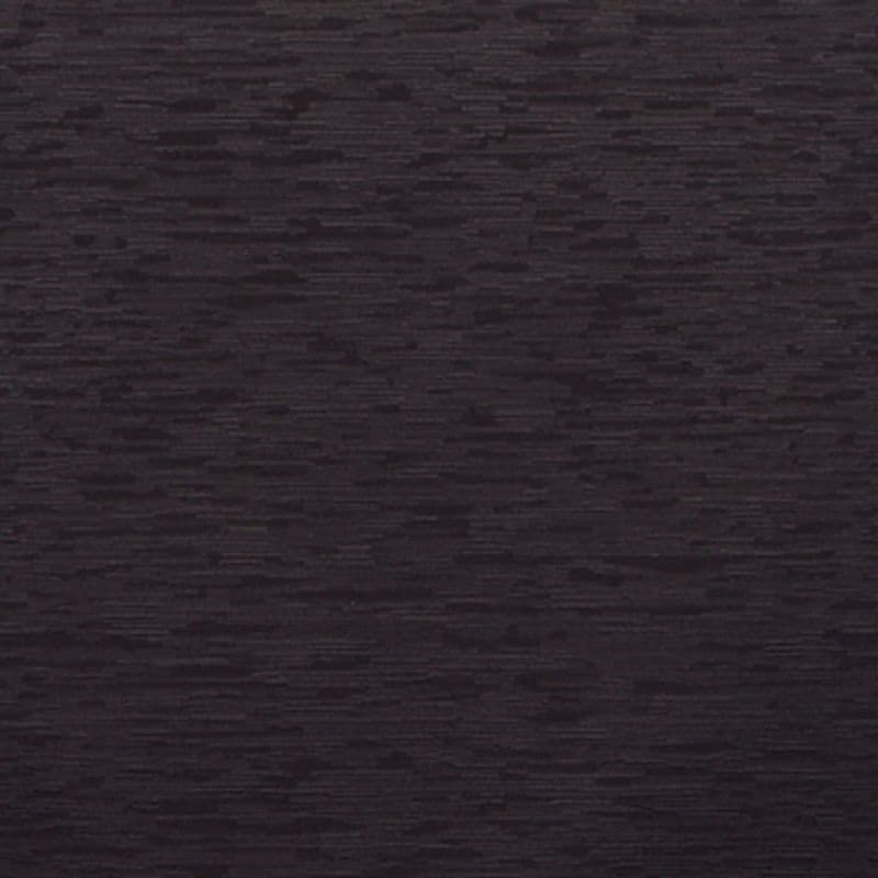 Dark charcoal wood-grain panel with fine horizontal striations and irregular darker patches, forming a uniform matte surface; close-up view in low ambient light with no visible surroundings.