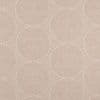 Beige-pink wallpaper with concentric dotted circular motifs repeats across the surface, forming overlapping rings on a flat, softly lit interior wall.