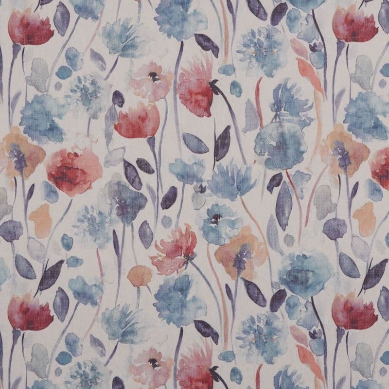 Floral watercolor fabric (curtain or wallpaper) with repeating blue, coral, and purple blossoms and leaves — covering a flat surface; soft, even lighting, close-up, pale neutral background.
