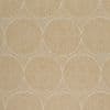 Beige-gold dotted wallpaper covering a wall, forming repeating large concentric circles; the dots create a textured radial pattern that overlaps across an evenly lit close-up interior surface.