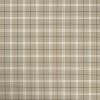Beige plaid wallpaper: thin white and dark lines forming a grid, covering a flat surface; displaying a tartan pattern in an evenly lit close-up with no other visible features.