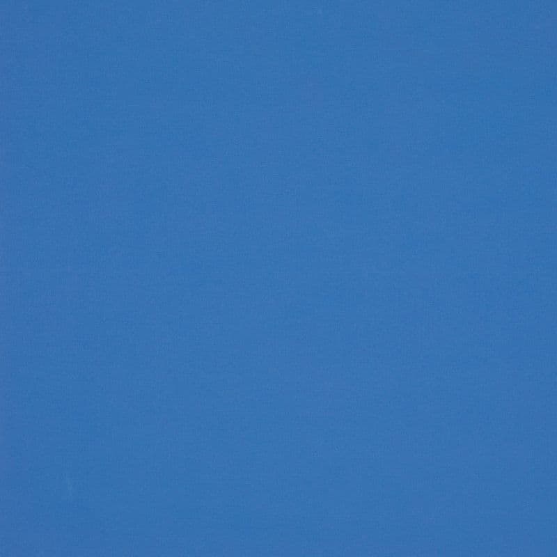 Solid blue fabric-like panel filling the frame, evenly lit and subtly textured; appears as a flat blue wall or clear sky with no distinguishing features or objects.