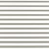 Horizontal zebra-style roller blind with alternating opaque gray and sheer white bands covering the window; bands aligned and closed, filtering diffuse daylight into a bright, neutral interior.