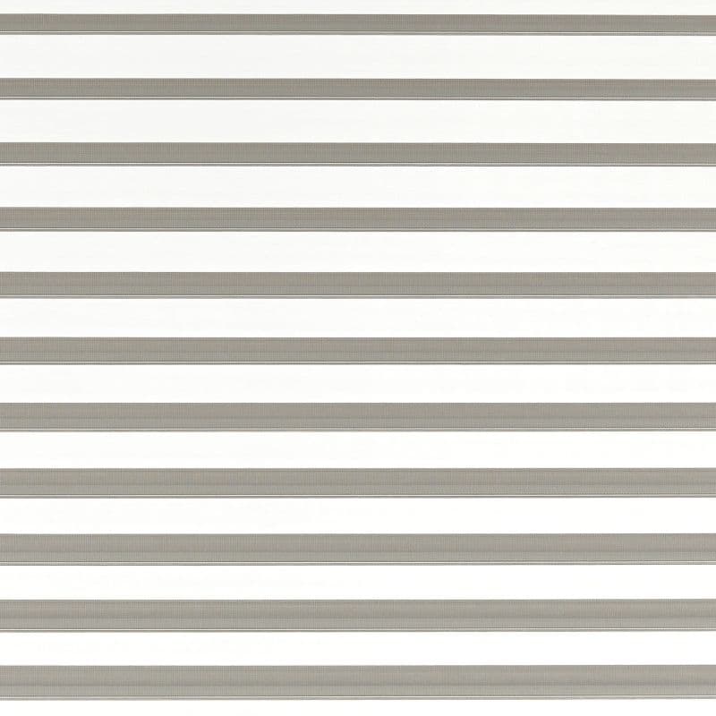 Horizontal zebra-style roller blind with alternating opaque gray and sheer white bands covering the window; bands aligned and closed, filtering diffuse daylight into a bright, neutral interior.