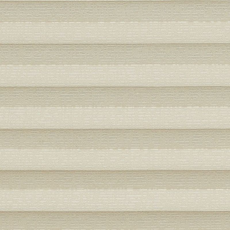 Honeycomb cellular shade, fully lowered with wide textured beige horizontal pleats; closed, softly diffusing warm daylight into a neutral interior and obscuring any exterior view.
