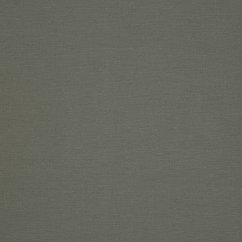 Olive-green textured fabric blind, fully lowered and smoothing light; fills the frame with a subtle horizontal weave, suggesting dim indoor lighting and no visible outside view.