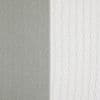 A pair of vertical curtains — left opaque gray textured panel, right white sheer with small rectangular mesh pattern — hanging closed, softly filtering daylight in a neutral interior.