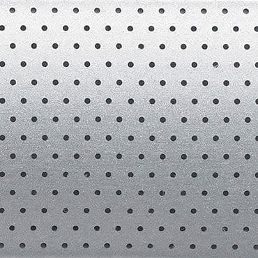 Perforated aluminum panel with evenly spaced round holes in a regular grid; serving as a vent or acoustic grille; shown under soft, diffuse lighting producing a subtle top-to-bottom gradient.