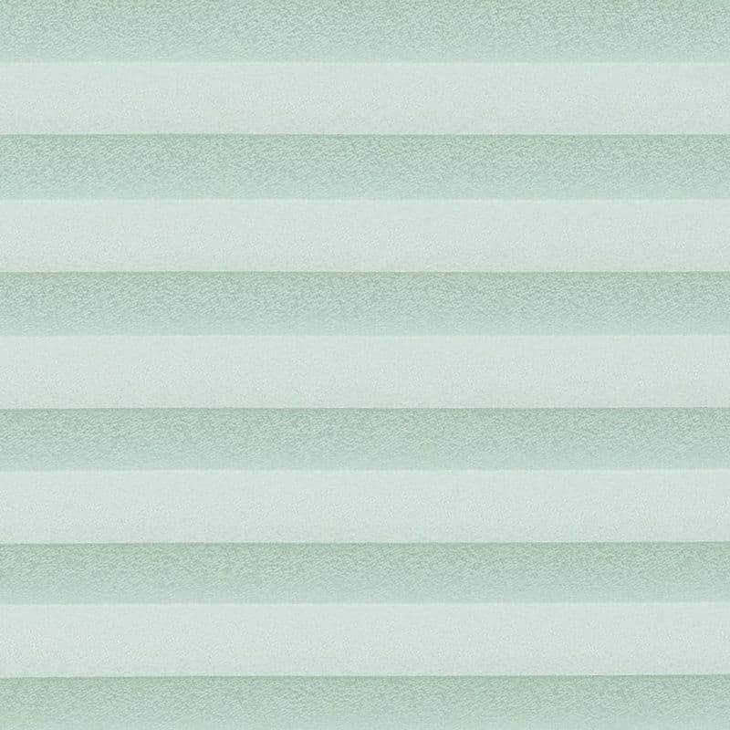 Horizontal cellular shades fill the frame, with alternating opaque and semi-sheer pale mint bands; they filter soft, diffuse light, suggesting a minimally furnished, evenly lit interior.