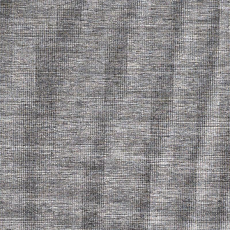 Gray woven roller blind, fully lowered and closed, filtering muted daylight; fills the frame, suggesting an interior window or wall with soft, even lighting and subtle horizontal weave texture.