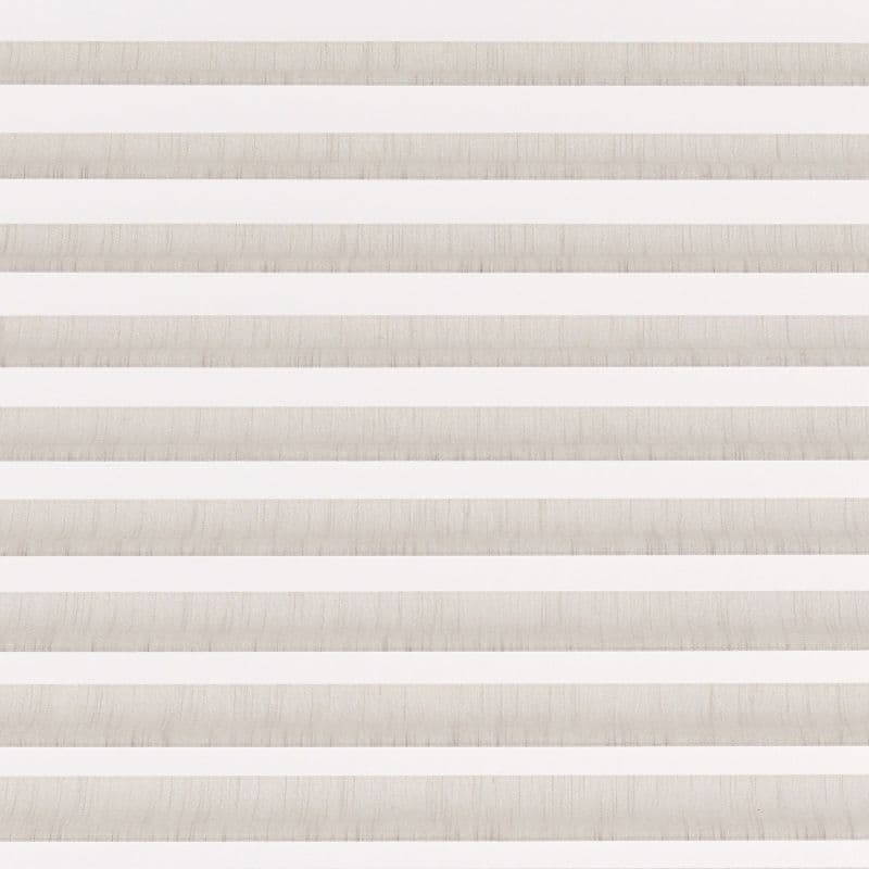 Striped zebra roller blind, full-width with alternating beige textured and white translucent horizontal bands, lowered and aligned, filtering diffuse daylight in a neutral-toned interior without any visible outside view.