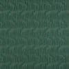 Textured teal wallpaper with narrow raised beige wavy vertical lines; pattern repeats continuously, forming undulating stripes across a flat surface in even, diffuse lighting.