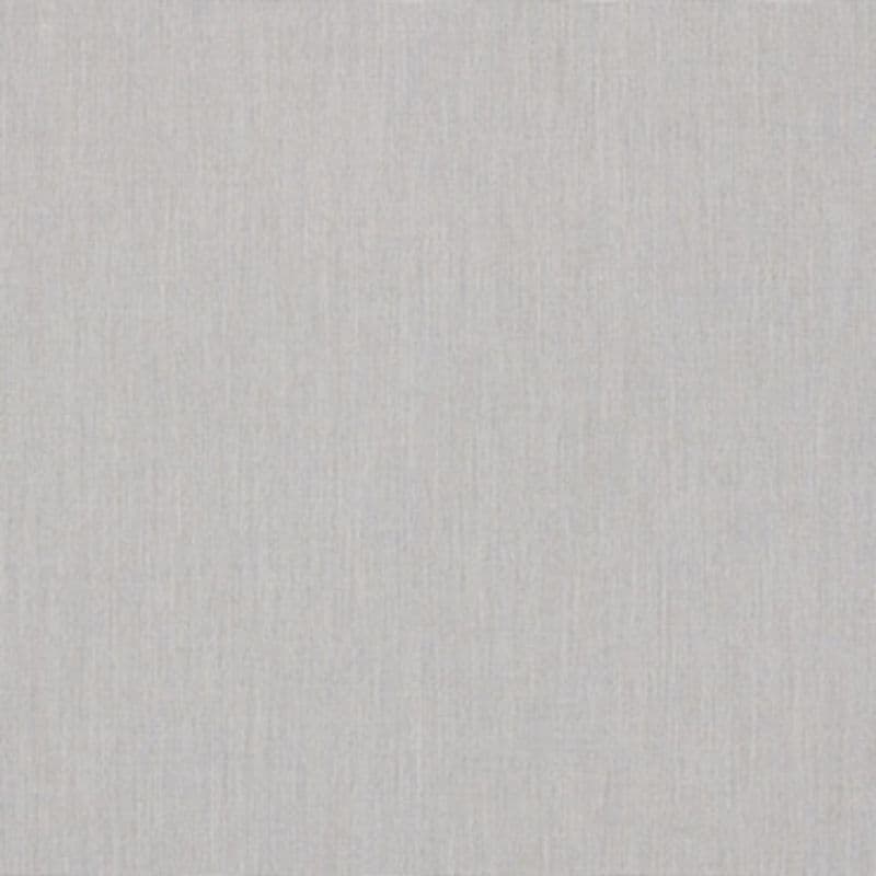 Light-gray woven fabric wallpaper covers a wall; its subtle vertical texture lies flat and unblemished, softly illuminated by diffuse light, suggesting a neutral, minimal interior surface.