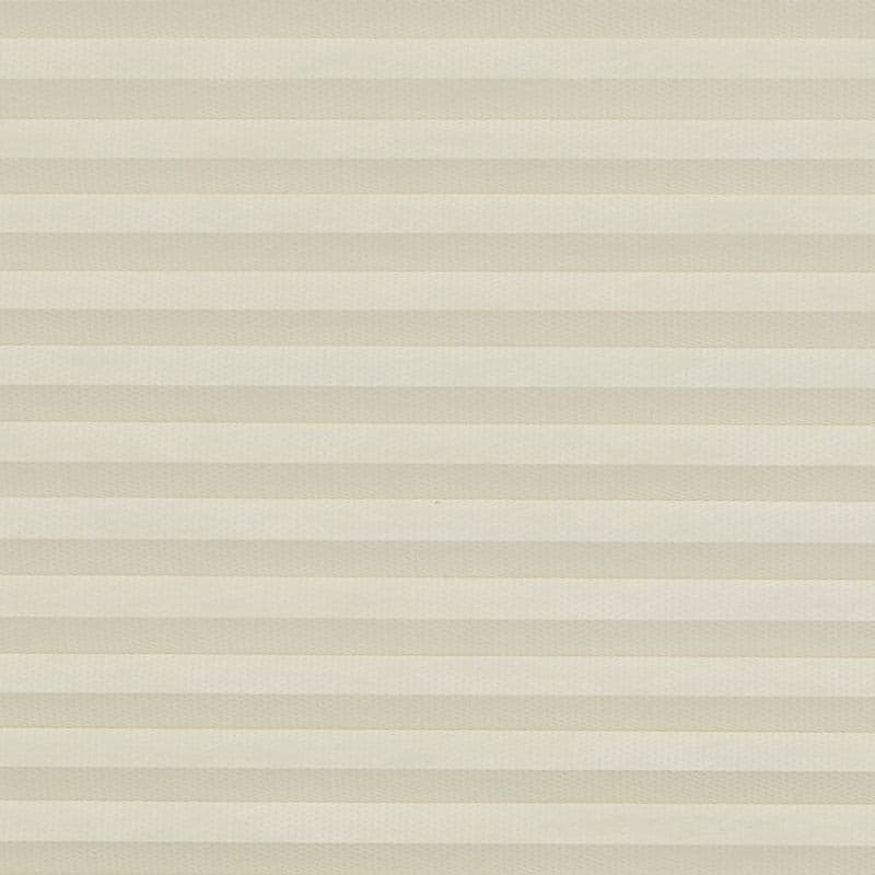 Beige honeycomb (cellular) pleated blind spans the frame, closed in even horizontal bands, softly diffusing light; plain interior setting with neutral lighting and no visible view.
