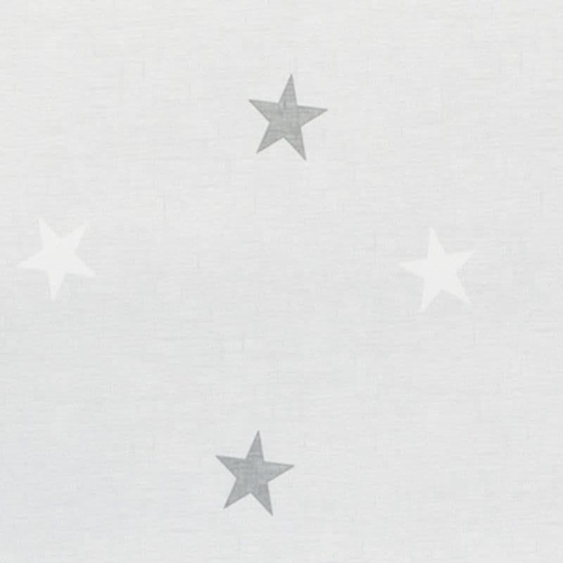 Sheer white curtain hung flat, patterned with faint five-point stars in alternating pale gray and near-white; filtering soft daylight over a neutral, evenly lit interior surface.