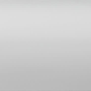 Smooth light-gray wall with subtle horizontal banding; stationary and evenly lit, occupying the frame, in neutral, softly diffused lighting suggesting a studio or blank background.