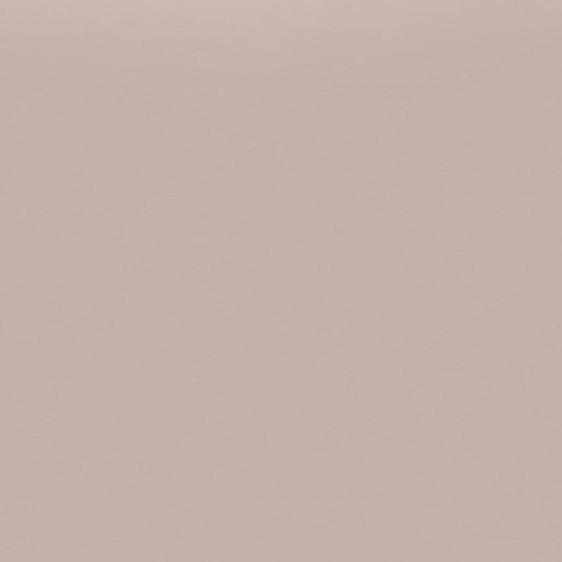 Plain pale pink‑beige textured surface fills the frame (object), appearing as a uniform wall or paper (action), evenly lit with subtle grain and no visible objects or distinguishing features (context).