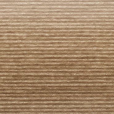 Beige corduroy fabric with narrow horizontal ribs — lying flat, showing pronounced ribbed texture — close-up macro view under warm, even lighting, no surrounding objects.