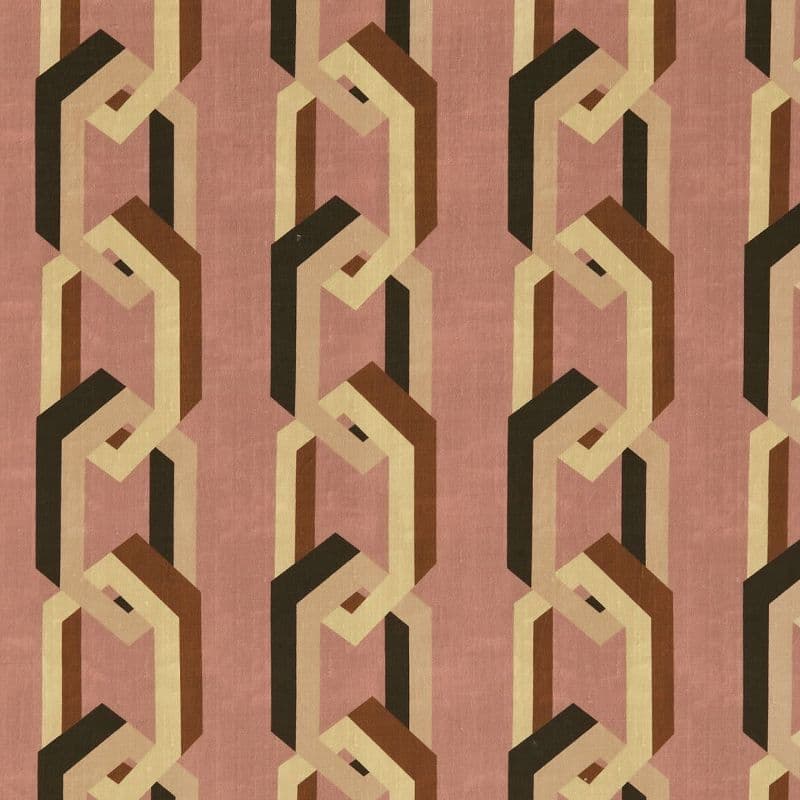 Geometric wallpaper featuring vertical, interlocking chain motifs in cream, brown, and black on a dusty-rose background; pattern repeats uniformly across a flat, evenly lit wall surface.