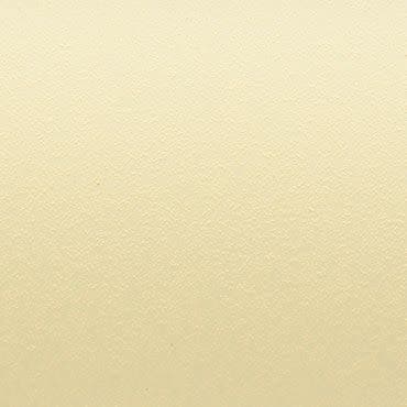 Textured pale gold wallpaper fills the frame; subtle granular sheen and fine stippled pattern; lying flat and uniformly lit, suggesting a neutral interior wall or decorative paper sample.